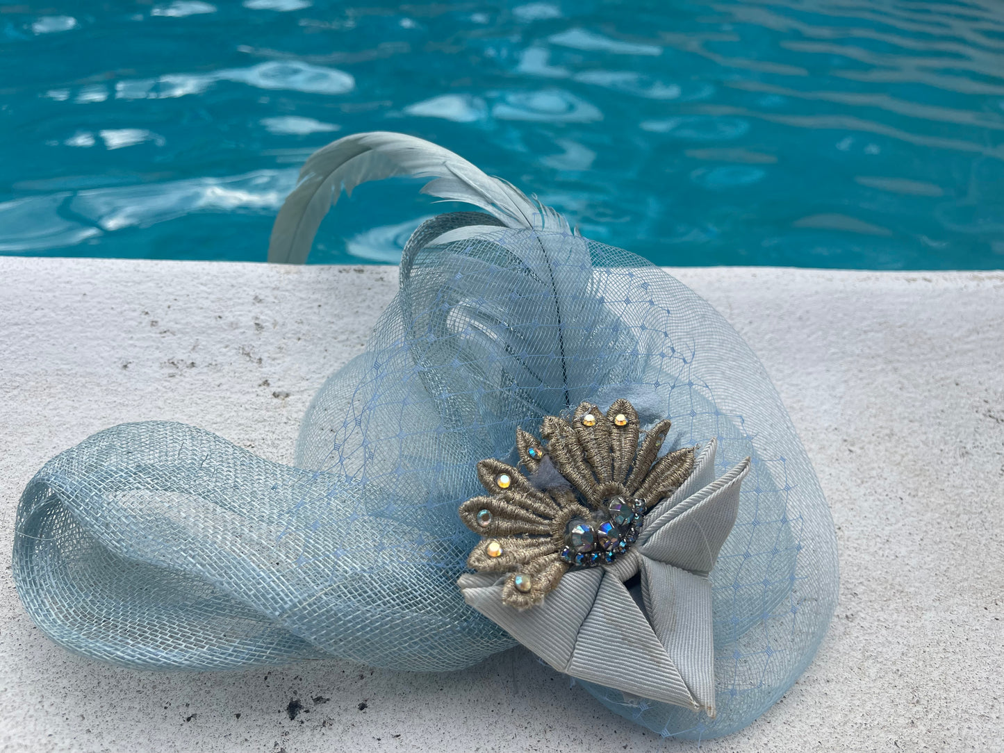 Light blue fascinator w 1920’s trim