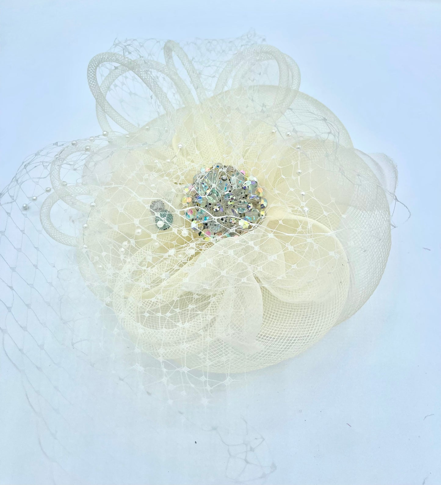 Bridal fascinator puff cream colored