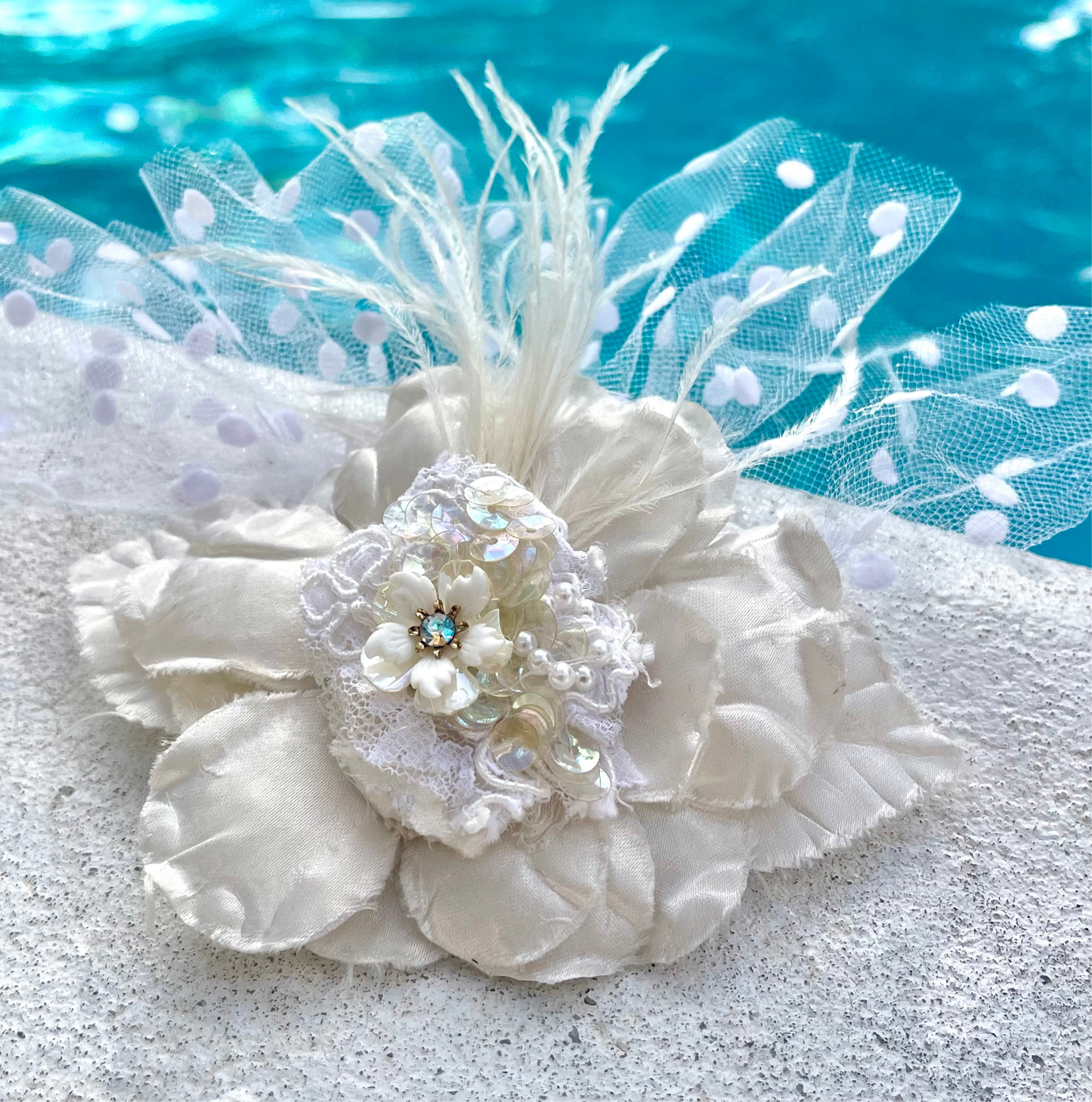 Floral wedding pin w netting and feathers