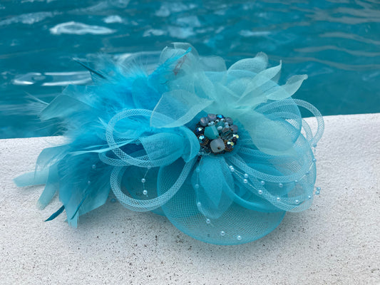 Blue fascinator w feathers and jewels